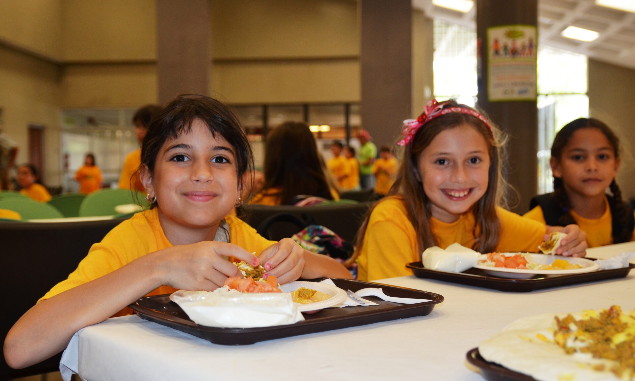 Kids enjoying Children’s Day meal at a restaurant in India